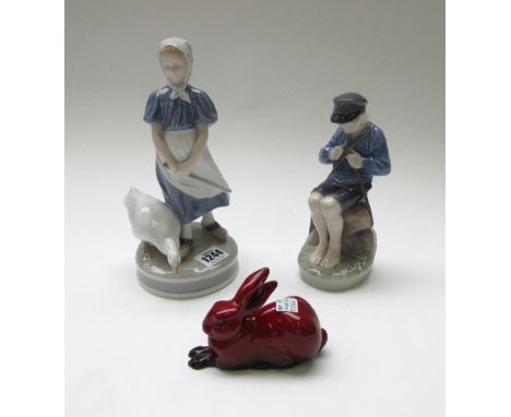 A Royal Copenhagen figure modelled as a young Dutch girl with a goose, no.527, another Royal Copenhagen figure modelled as a 