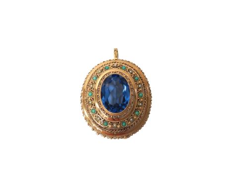A gold, blue topaz, turquoise and seed pearl set oval pendant brooch, mounted with the oval cut blue topaz at the centre, wit