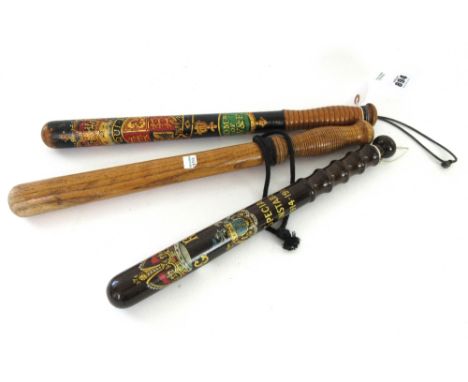A Victorian painted wooden truncheon stamped 'Parker Holborn 233' (46cm), another painted policeman's truncheon detailed 'GR 