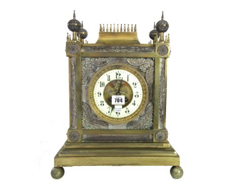 A French gilt brass cased mantel clock of Gothic cathedral form, enclosing a Japy Fres two train movement, 40cm high, (key an