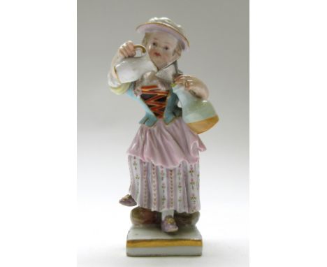 A Meissen porcelain figure, late 19th century, modelled as a lady with jug and decanter, on a gilt square base.  Blue crossed