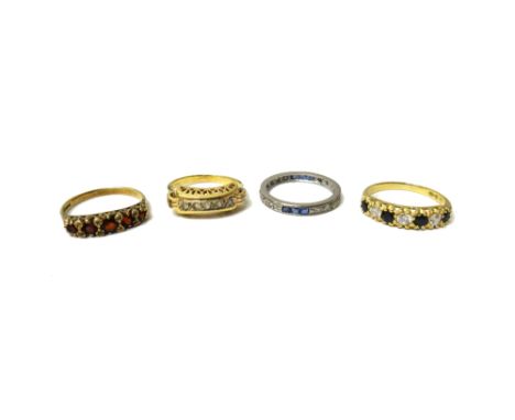 A sapphire and diamond set full eternity ring, mounted with rows of three square cut sapphires alternating with rows of three