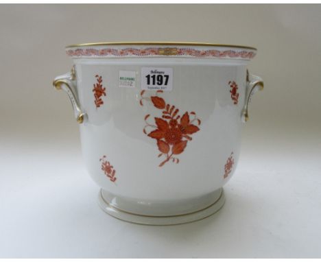 A quantity of Herend porcelain table wares, decorated in the 'Chinese rust bouquet' pattern, comprising; a pair of twin branc