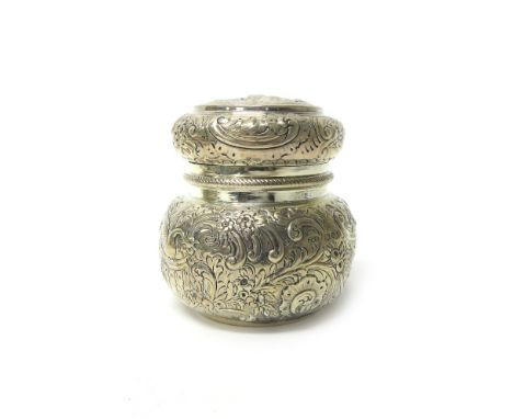 A Victorian silver tea caddy, of bun form, embossed with birds, floral and foliate scrolls, the pull-off lid with a China man