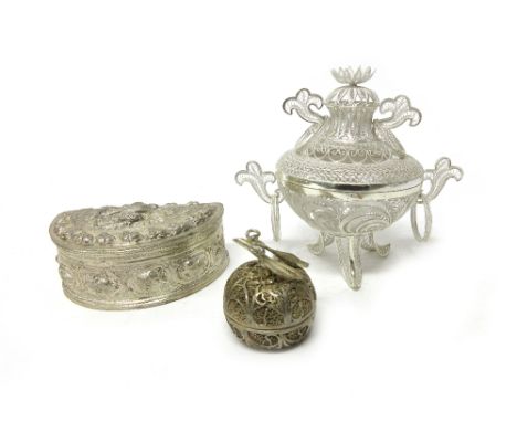 A filigree model of an Oriental twin handled incense vase and cover, fitted with ring handles and raised on three feet, detai