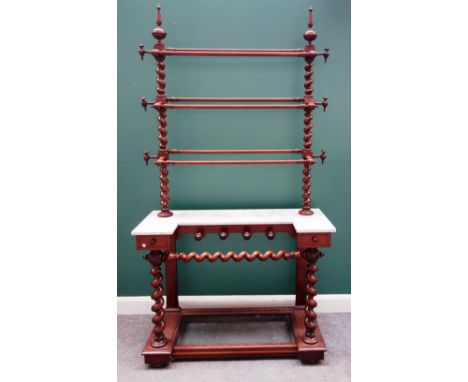 A Victorian mahogany hall stand, with barley twist and turned three tier upper section, over a marble topped stick stand base