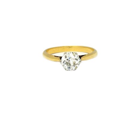 A gold and diamond single stone ring, claw set with a cushion shaped diamond, the shank unmarked, ring size M and a half, the