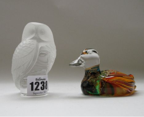 A Lalique clear and frosted glass model of an owl, etched mark to base (9cm high) ad a gilt foliate coloured glass duck, (2).
