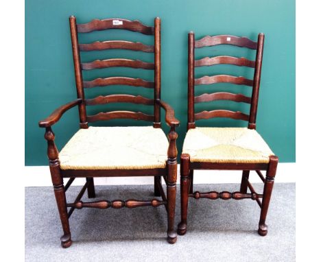 A set of eight 18th century style Lancashire ladder back dining chairs, with wavy splat on turned supports, to include a pair