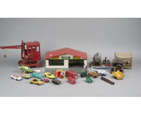 Collectable vintage toys, including; a Tri-ang crane, a German steam engine, a quantity of die-cast vehicles and sundry, (qty