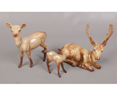 A Beswick porcelain Deer family light brown Stag, Doe and Fawn. 