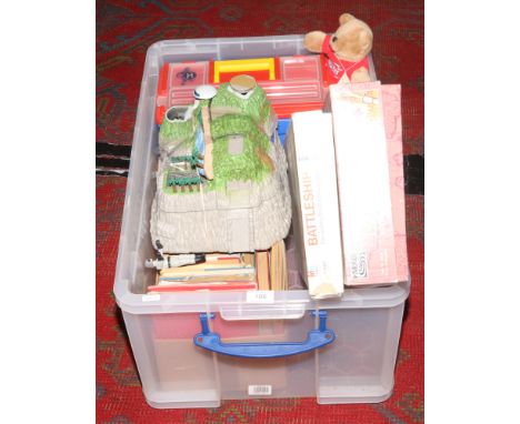 A box of children's toys and books to include Action Man accessories, Enid Blyton books, boxed risk board game etc. 