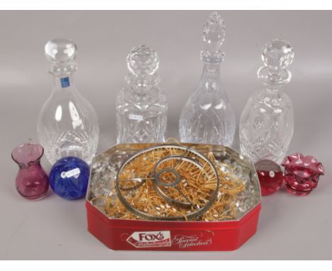 A collection of glassware to include decanters, paperweights, light pendants etc. 