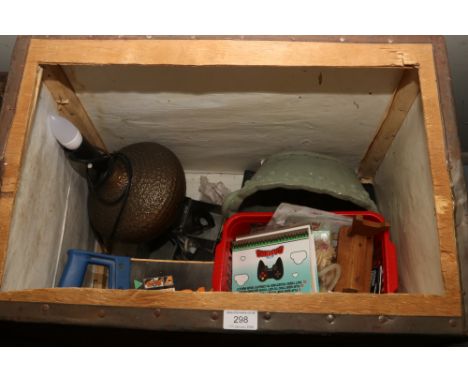 A wooden trunk and tea chest to include brass table lamp, saw and collectables. 