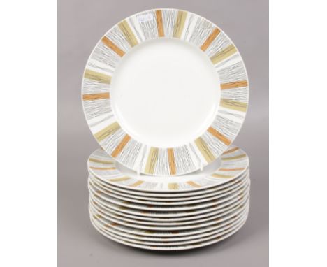Fourteen Midwinter dinner plates in the Sienna design. 