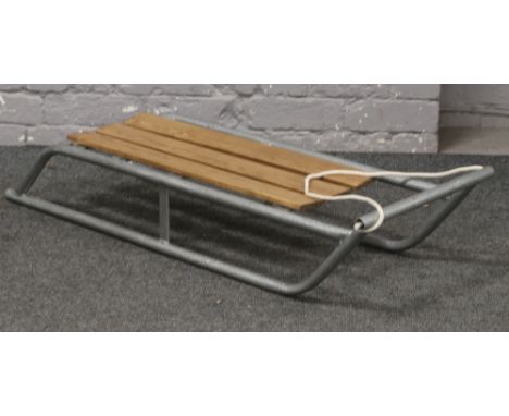 A child's vintage aluminium framed / wooden sledge. 