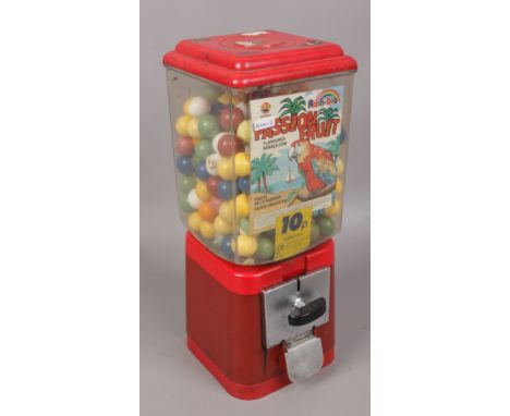 A vintage 10p bubble gum machine with contents. 