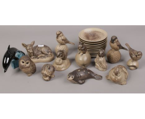 A collection of poole animals and birds to include Field Mouse, Owl, Duck and Deer, along with eleven decorative plates. 