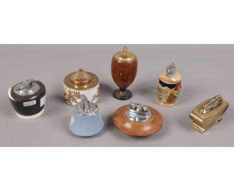 Seven table lighters to include Wedgwood, Carltonware, Ronson examples etc. 