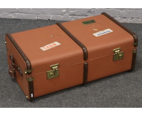 A twin handled travel trunk. 