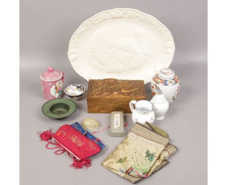 A collection of Oriental ceramics, along with a Quimper jug, dragon decorated box, silk purse and soapstone scarab beetle etc