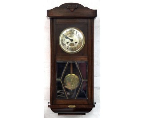 A GERMAN STAINED WOOD WALL CLOCK, 80CM H, CIRCA 1920