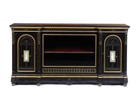 A VICTORIAN PARCEL GILT AND EBONISHED MAHOGANY CABINET, C 1870 the glazed door flanked by arch panelled doors centred by Wedg