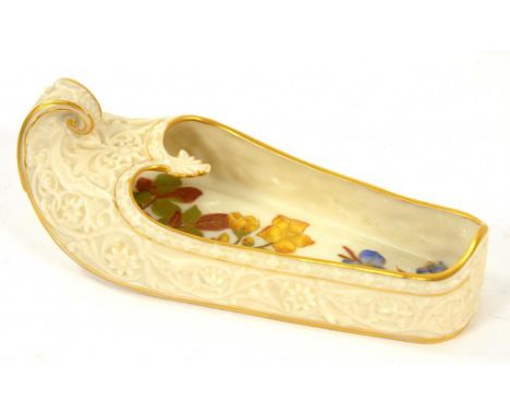 A ROYAL WORCESTER OLD IVORY 'INDIAN SLIPPER SHOE', C1886 16.5cm l, impressed and printed marks