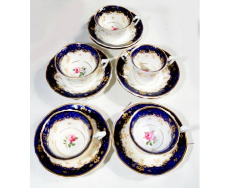 A JOHN RIDGWAY COBALT GROUND PART TEA AND COFFEE SERVICE, OF OLD ENGLISH SHAPE, PAINTED WITH A CENTRAL ROSE, PATTERN 137, CIR