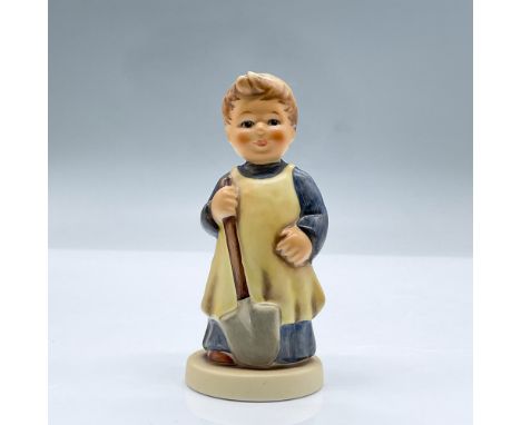 Features a small child holding a shovel. M.I Hummel Club, Membership year 1998/1999. This item has its original box measuring