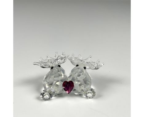 Adorable mini figure featuring a pink heart accent between two moose. Iris Arc mark at the bottom. This item includes an orig