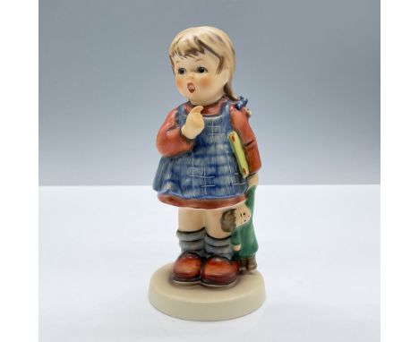 Features a young girl dressed in colorful clothes holding her doll. M.I Hummel mark on base. Goebel backstamp. This item has 