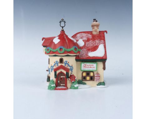 This hand painted porcelain figurine is called Custom Stitchers. This item has its original box that measures 8.5"L x 6.25"W 