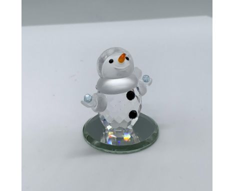 Magical miniature snowmen with clear body and a frosted face, scarf and hat, Features black buttons, an orange nose and each 