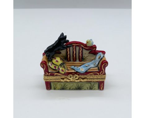 Hand painted porcelain decorative box for jewelry in a detailed sofa shape with a cat playing with a little bird. Marked C.P.