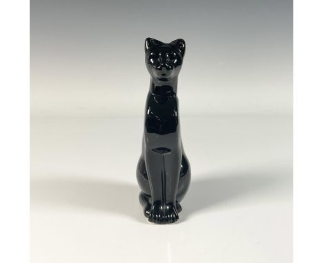 Serene crystal cat figure with a beautifully smooth finish. Baccarat backstamp. Dimensions: 3"L x 2.25"W x 6.5"HManufacturer: