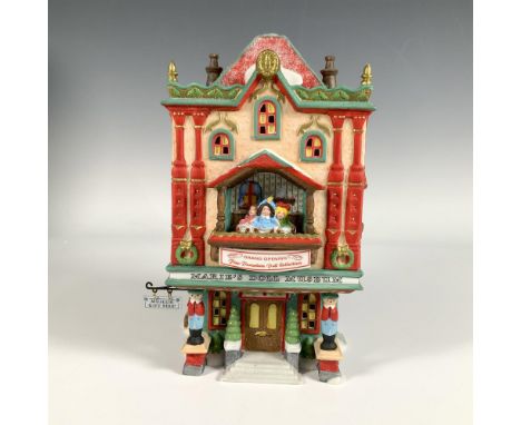 Hand painted porcelain building, Marie's Doll Museum features an elegant design with a grand opening display for the Fine Por