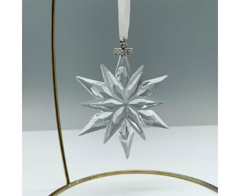 Limited edition for Swarovski 20th anniversary Christmas ornament of a crystal clear snowflake. Features a hanging plaque wit