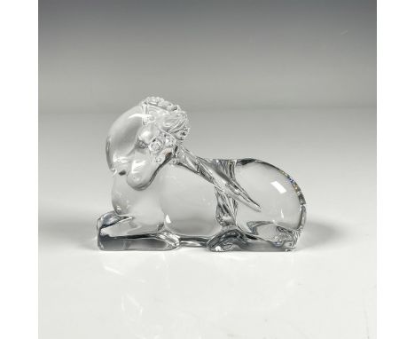 Clear crystal figurine capturing a peaceful moment of horse taking a rest. Baccarat backstamp. Dimensions: 4.5"L x 2"W x 3.25