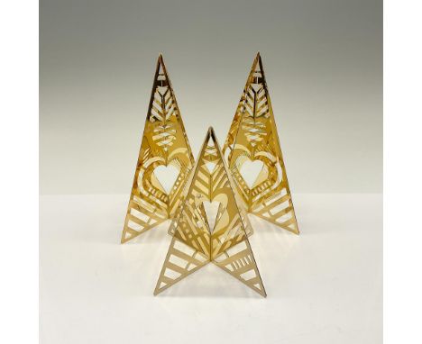 This is a collection of three tabletop Christmas trees crafted from 18 kt. gold plated stainless steel. It includes two mediu