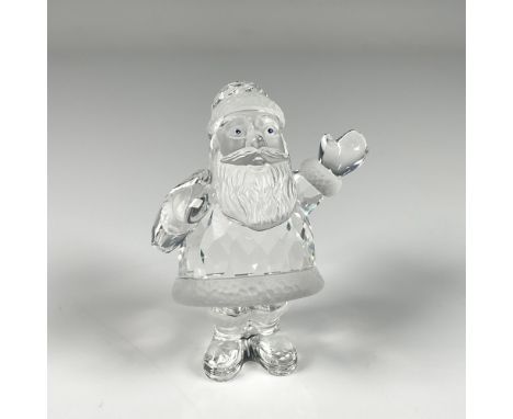 Charming figure featuring a Santa Claus waving hello, showing a beautiful combination of frosted and clear crystal with exqui