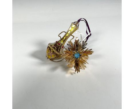Handcrafted pair of ornaments featuring the Imperial Kildare Drop, adorned with shining ruby gems that complement an intricat