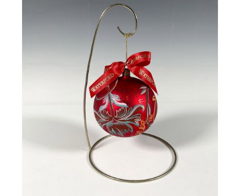 Handcrafted glass bauble adorned with hand-painted flowers in pink, blue, and yellow shades that gracefully curve around the 