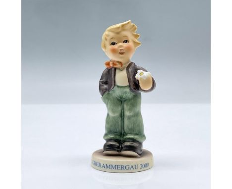 Small figure of a boy holding a white flower. Flower For You 2077/B. First Issue Erste Ausgabe Millennium 2000. This item has