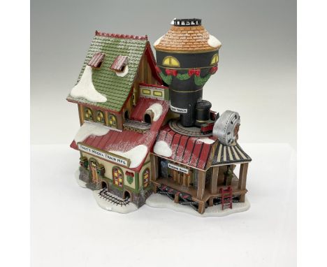 This porcelain figurine is called Toot's Model Train Mfg. Comes with light kit. This item has its original box that measures 