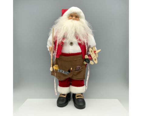 Lovely large figure of Santa with instruments and tools in his tool belt as he gets ready to build toys. Issued: 20th century