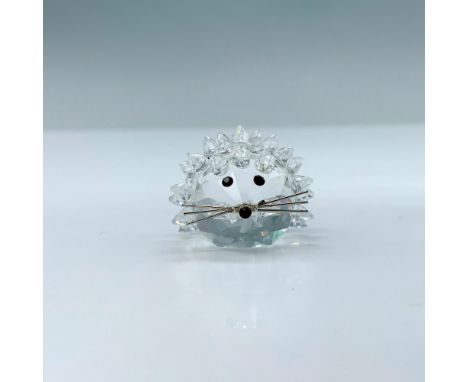 Beautiful miniature of facetted spines presenting a hedgehog in defense position, Features black crystal eyes and metal long 
