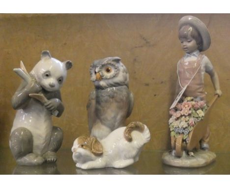 Lladro figure of child with wheelbarrow and three figures by Nao, owl, panda and dog (4)