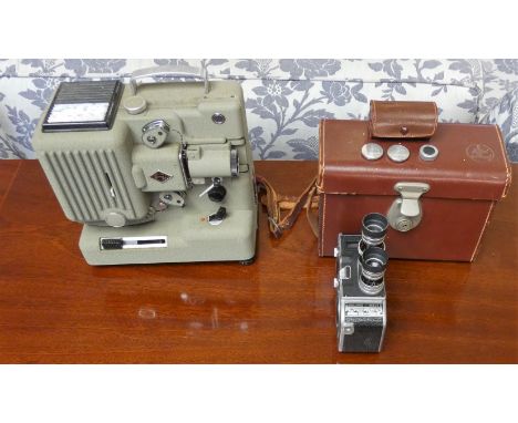 An Eumig P8 projector and a Paillard Bolex B8 cine camera and case