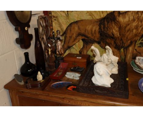 A quantity of various items to include a carved oak twin handled tray, Religious figures, crucifix's, glass bottles, trinket 